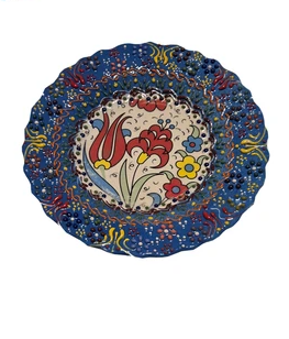 Decorative plate with floral design on a white background