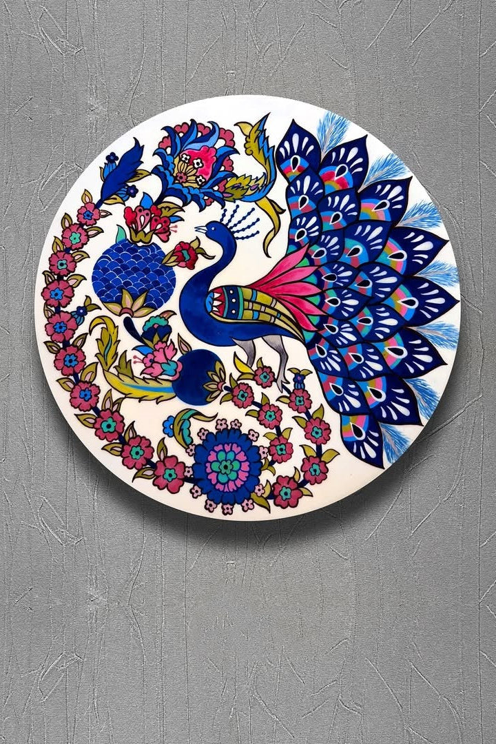 Round coaster with a colorful peacock design on a gray background