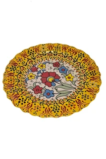 Decorative plate with floral design on a white background